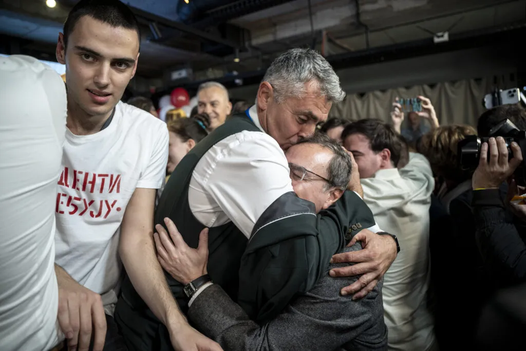 Supporters celebrate at Student List HQ in Belgrade