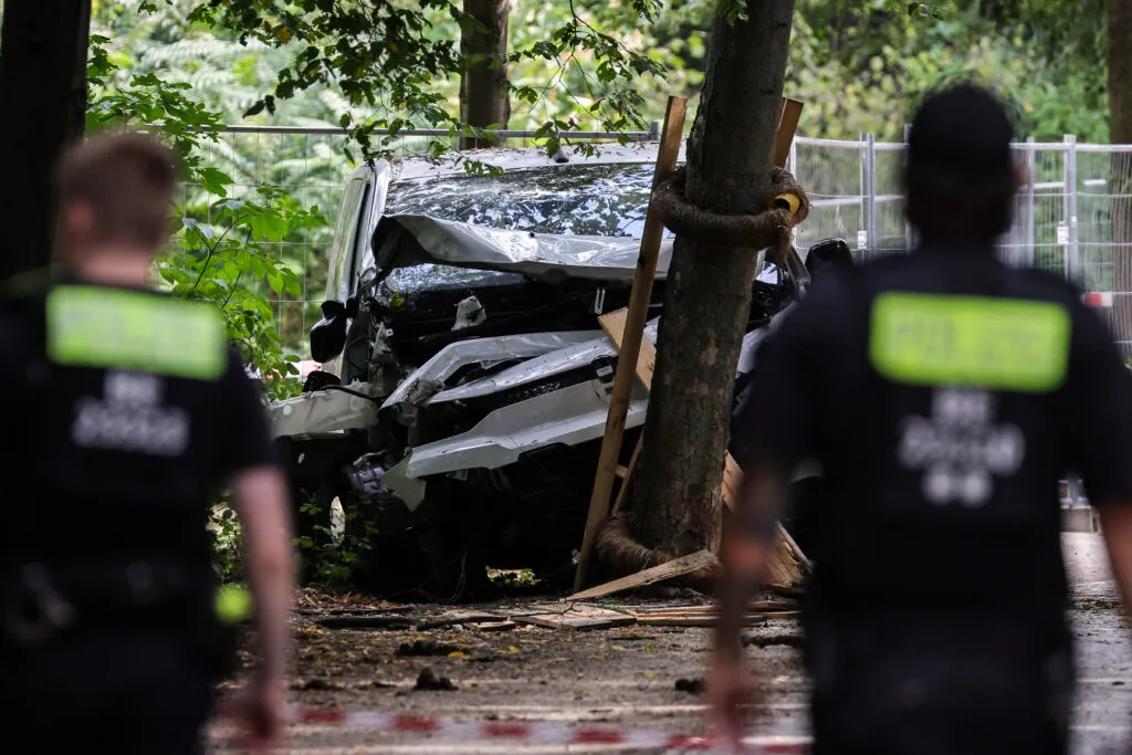 German police near the white van used in the attack.