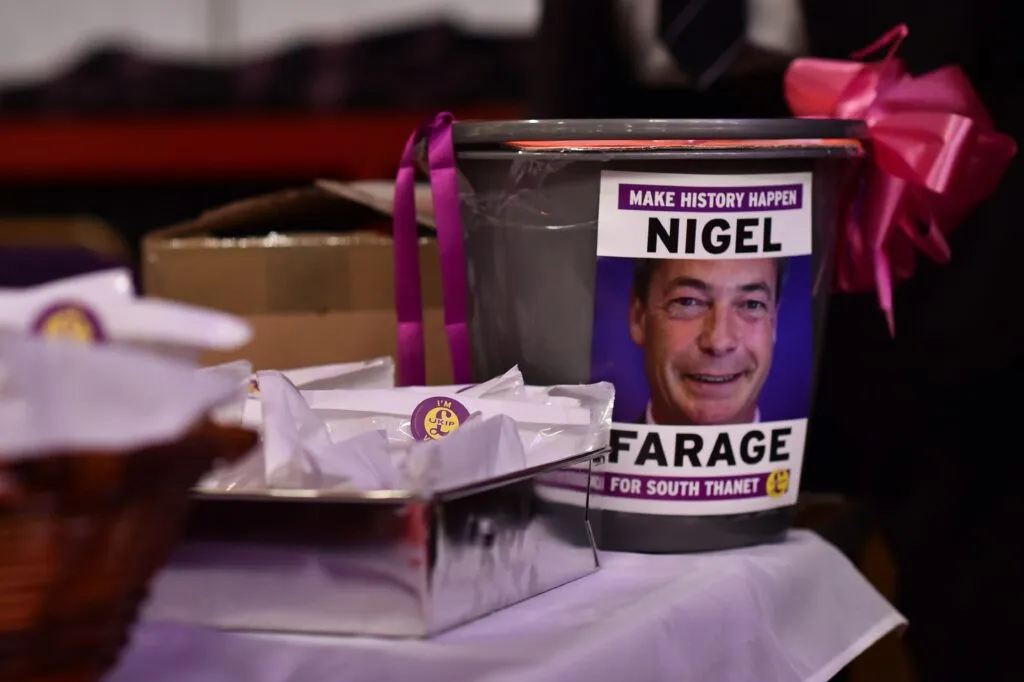 A donations bucket featuring Nigel Farage at a UKIP conference in Margate in 2015