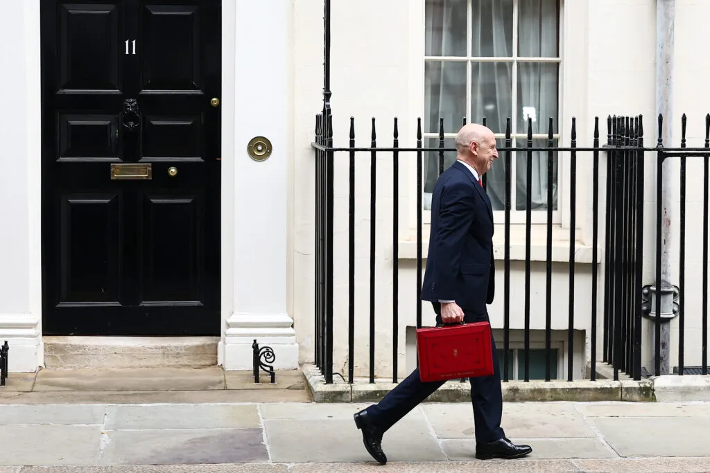 Healey leaving No. 11 Downing St.