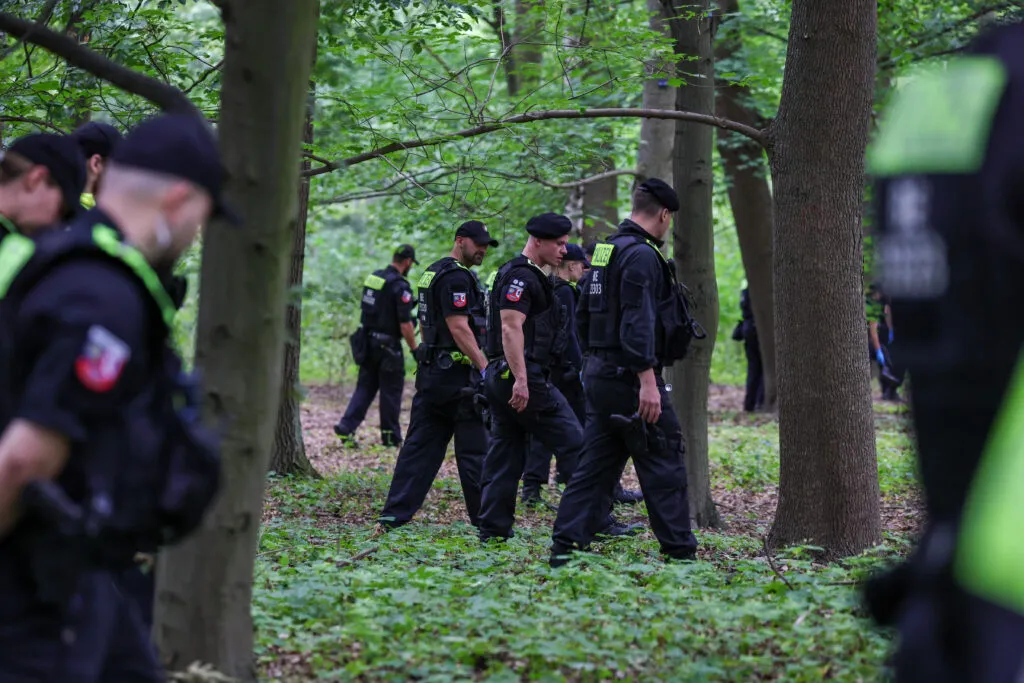 Police search the ground of Tiergarten park.
